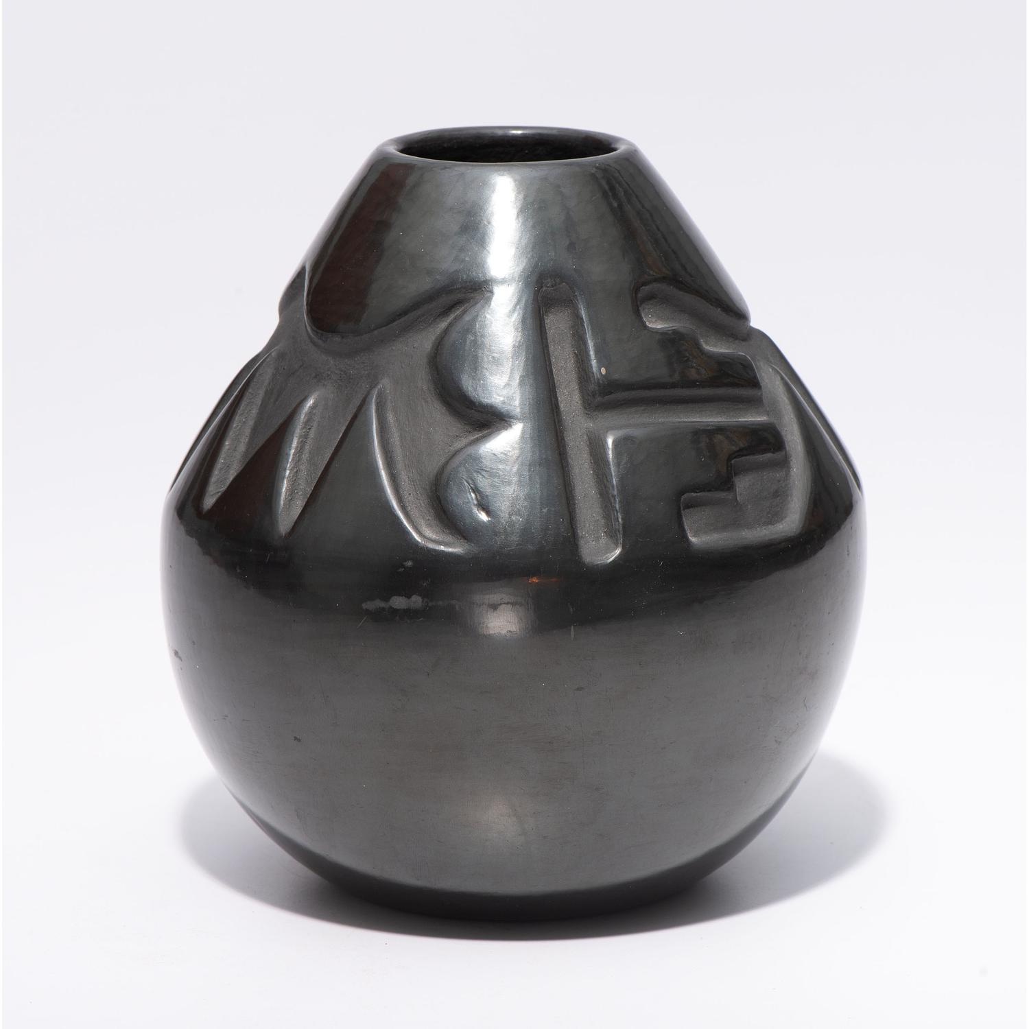 Deeply Carved Blackware Vase