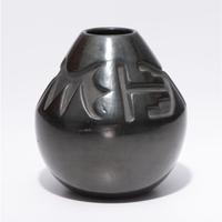 Deeply Carved Blackware Vase