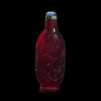 A Chinese Carved Ruby Glass Snuff Bottle, Probably Imperial Workshop, 18th Century
