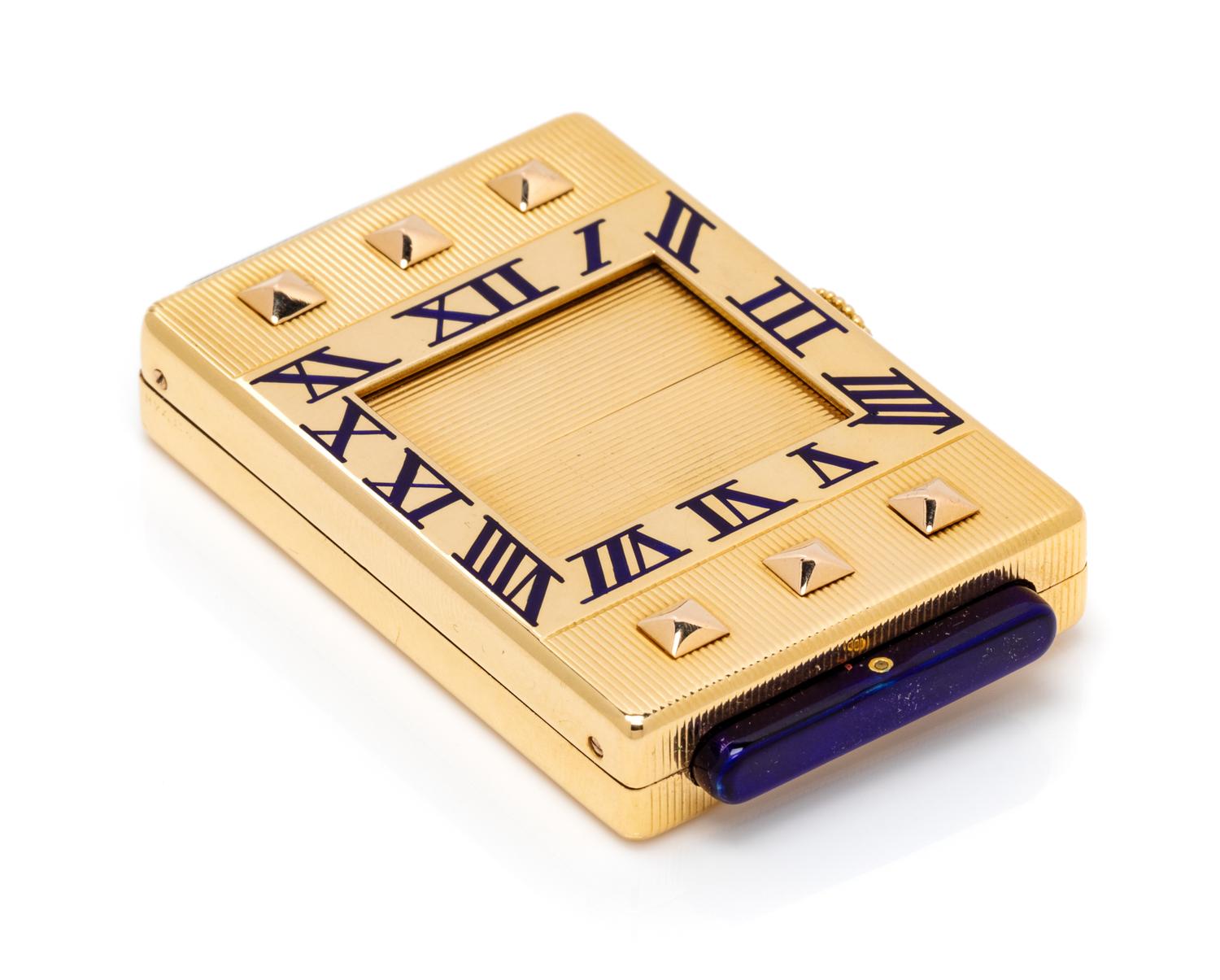An Art Deco 18 Karat Yellow Gold and Enamel 'Eclipse/Guillotine' Travel Clock, Cartier, Circa 1929, 42.45 dwts.