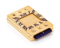 An Art Deco 18 Karat Yellow Gold and Enamel 'Eclipse/Guillotine' Travel Clock, Cartier, Circa 1929, 42.45 dwts.