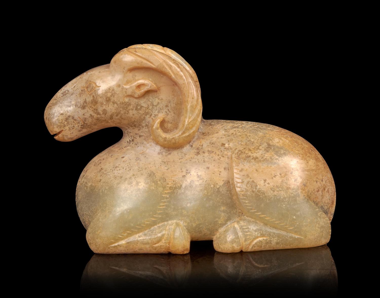 A Calcified Jade Figure of a Ram