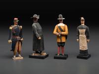 A Collection of Folk Art Carved and Painted 'English Parade' Figures