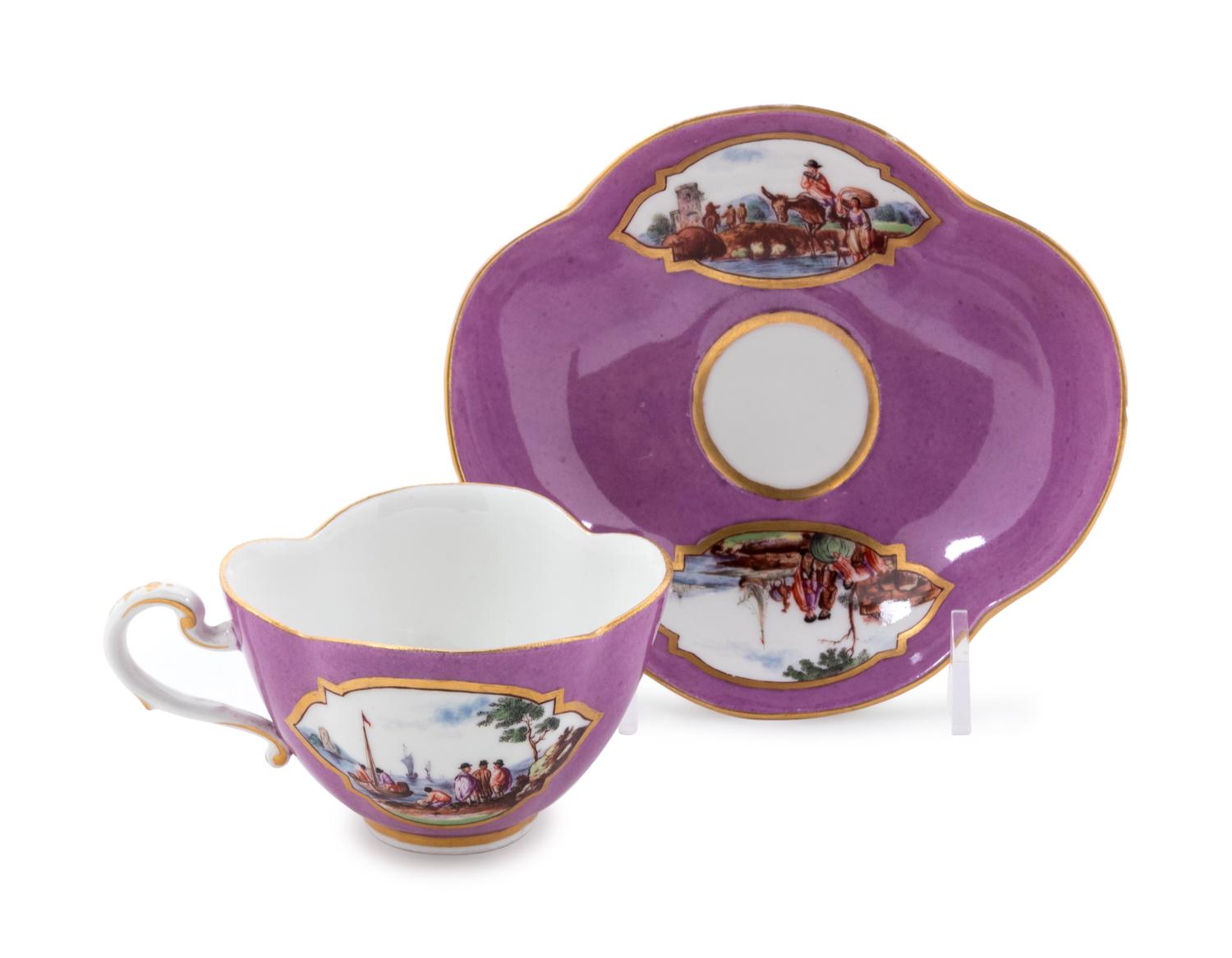 A Meissen Painted and Parcel Gilt Porcelain Teacup and Saucer