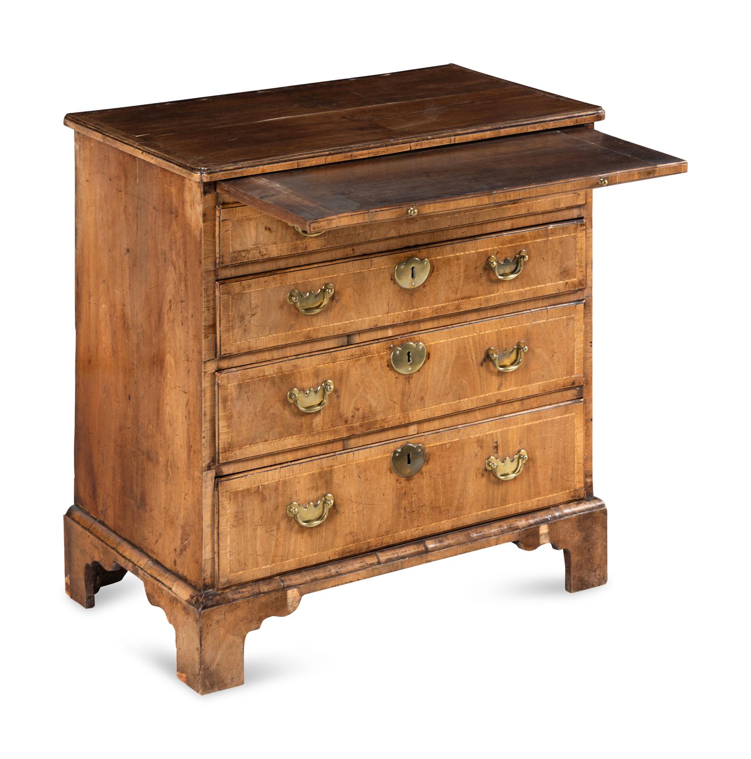 A George II Walnut Chest of Drawers