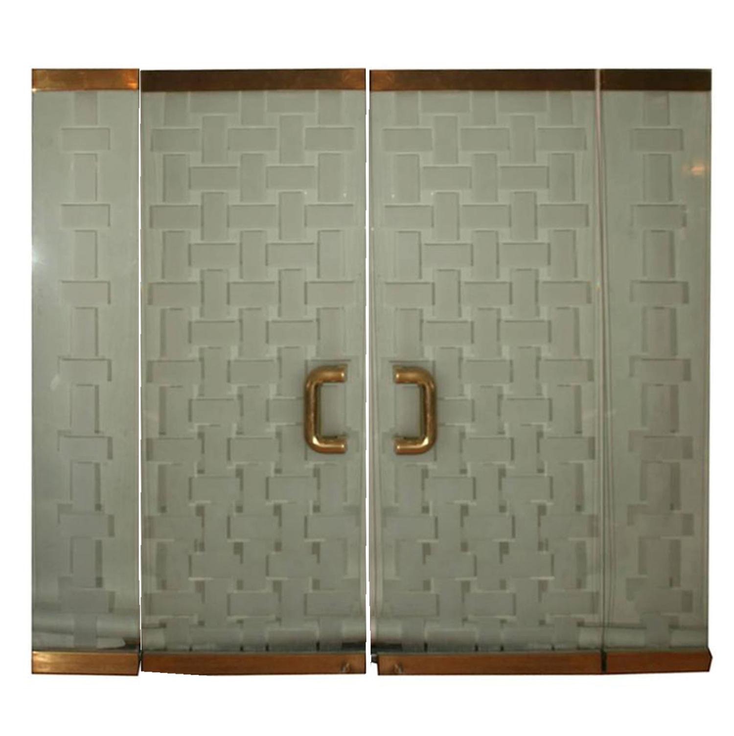 A Mid-Century Brass and Glass Entryway 72" W x 6" D x 96" H — United States, Mid-20th Century