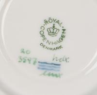A Set of Twelve Royal Copenhagen Flora Danica Porcelain Teacups and Saucers