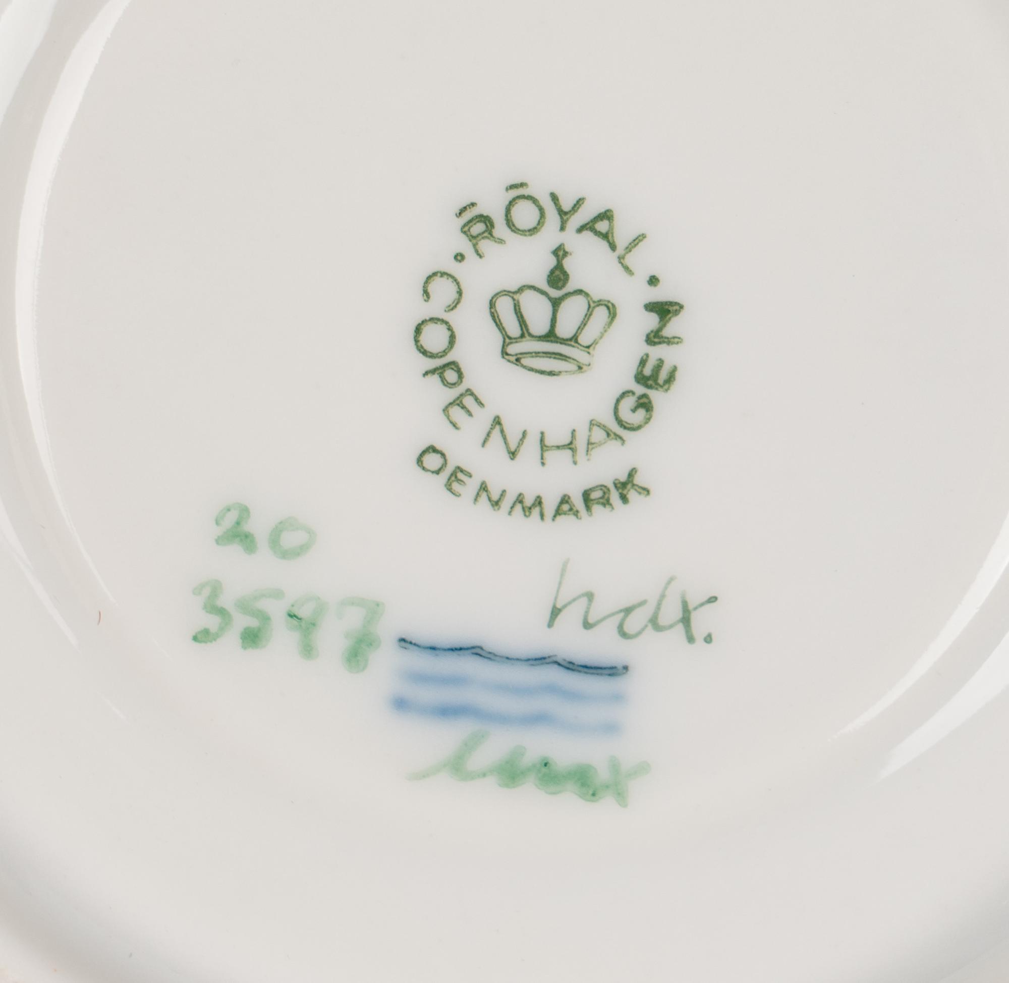 A Set of Twelve Royal Copenhagen Flora Danica Porcelain Teacups and Saucers