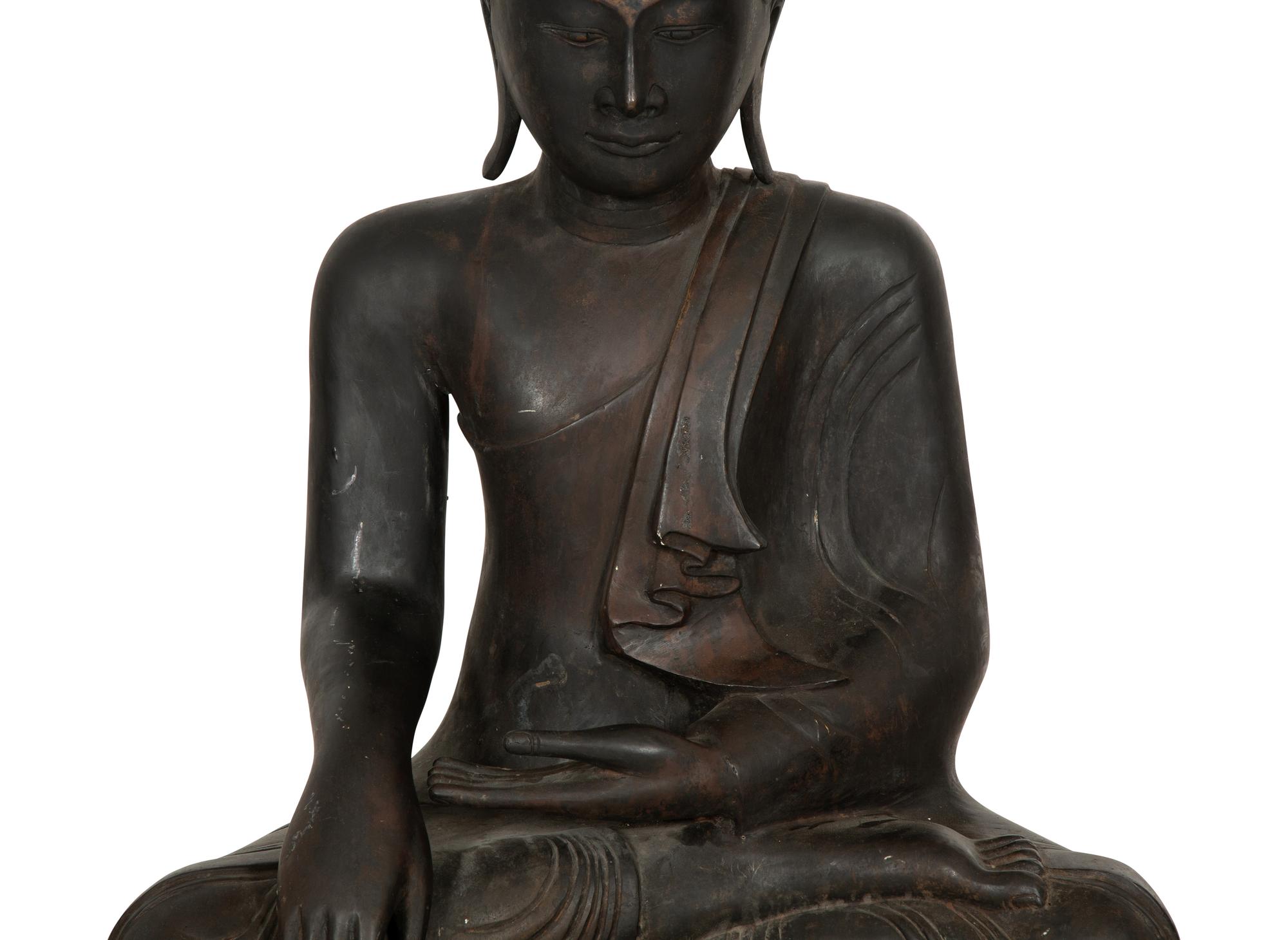 A Large Southeast Asian Bronzed Metal Seated Buddha