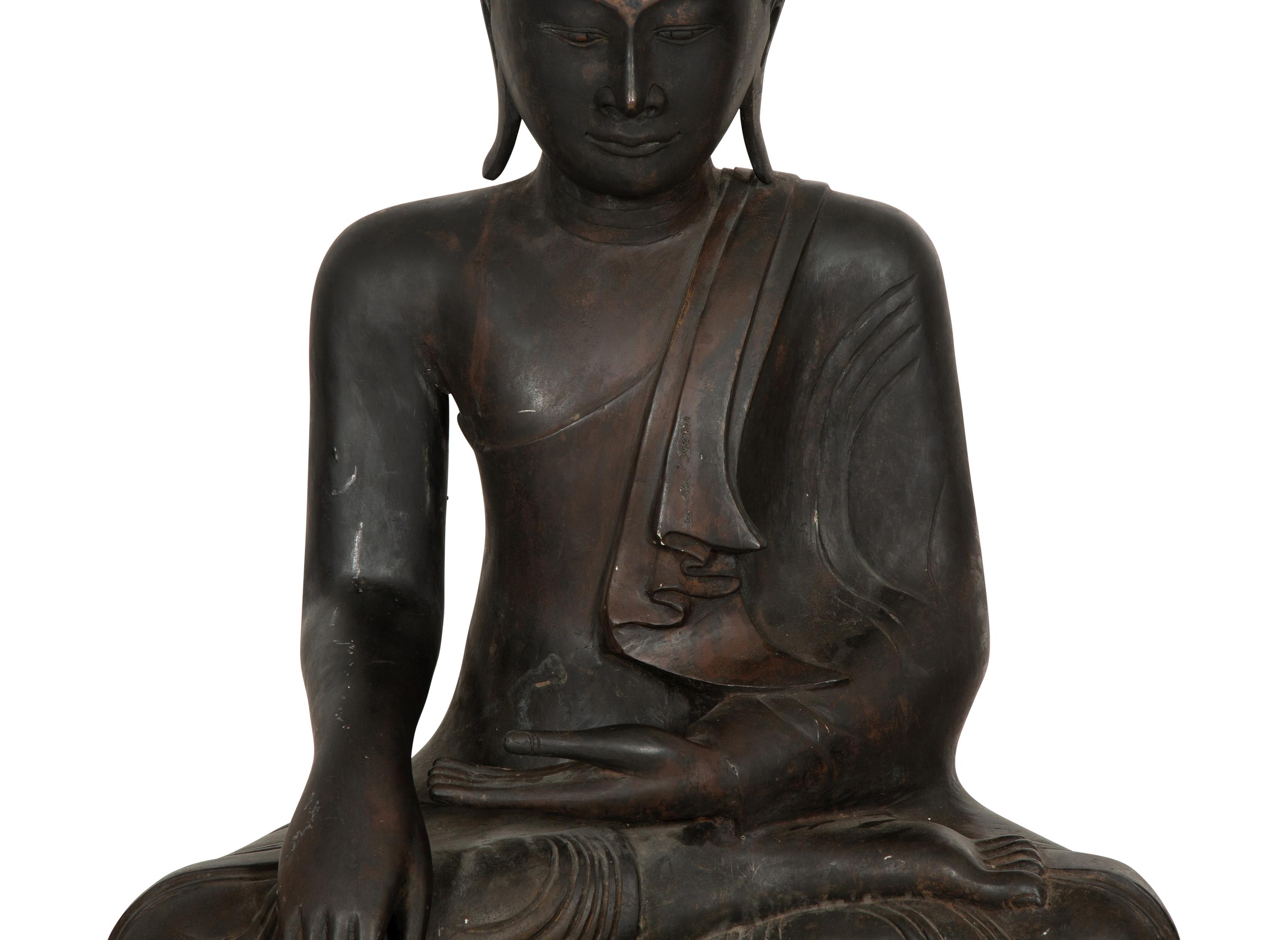 A Large Southeast Asian Bronzed Metal Seated Buddha