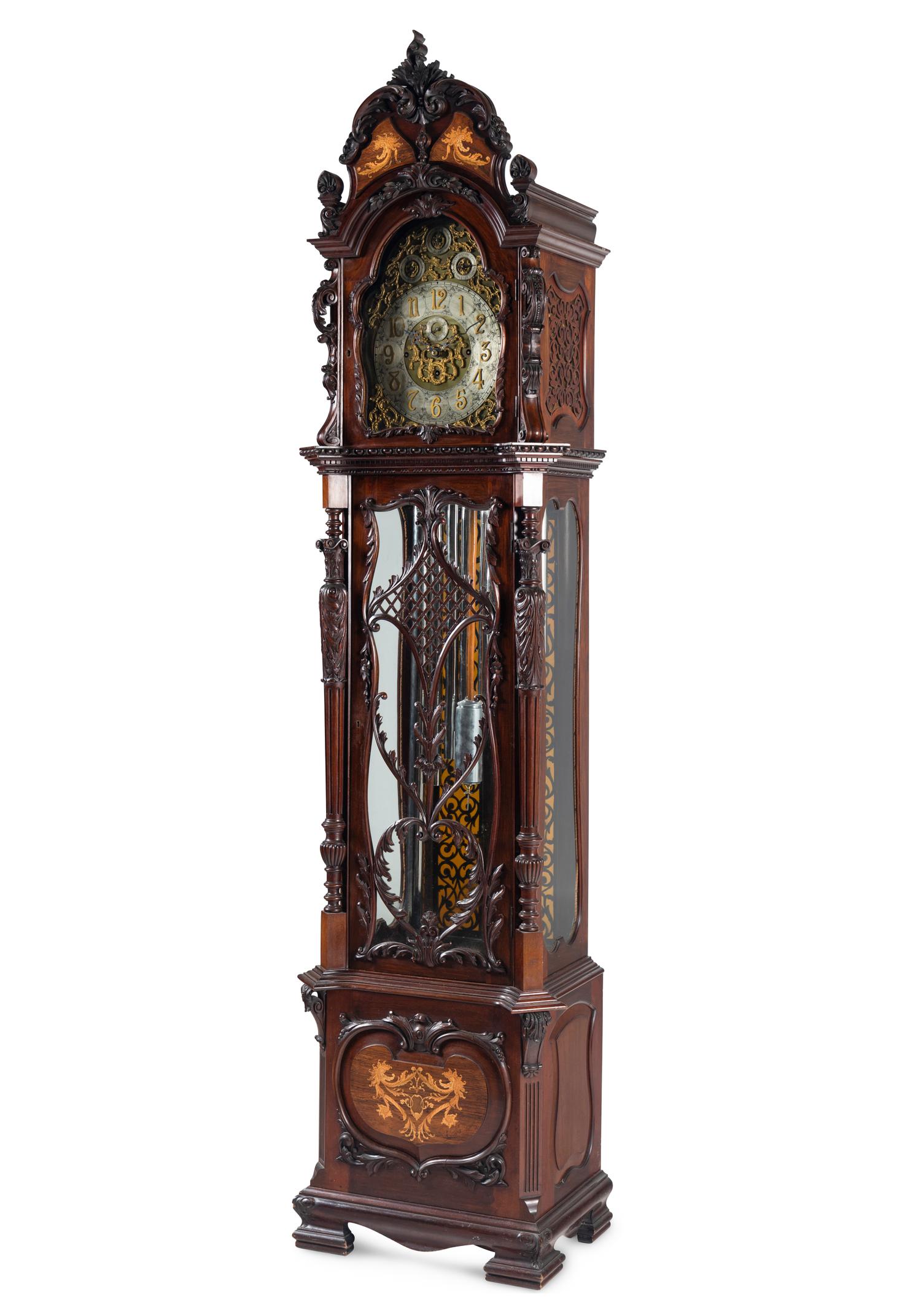 A Victorian Carved Mahogany and Marquetry Nine-Tube Tall Case Clock