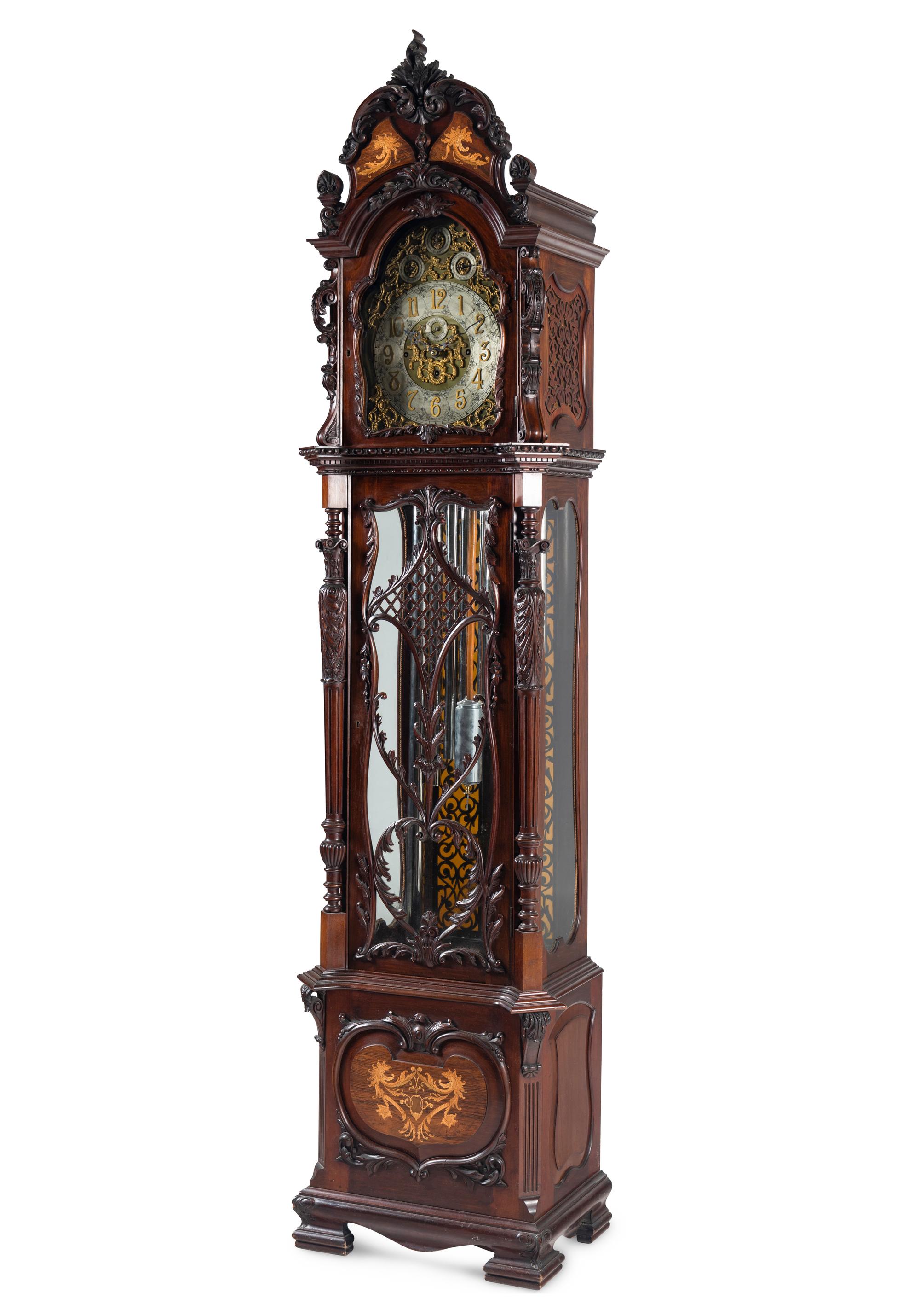 A Victorian Carved Mahogany and Marquetry Nine-Tube Tall Case Clock