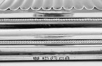 A Pair of English Silver Candlesticks