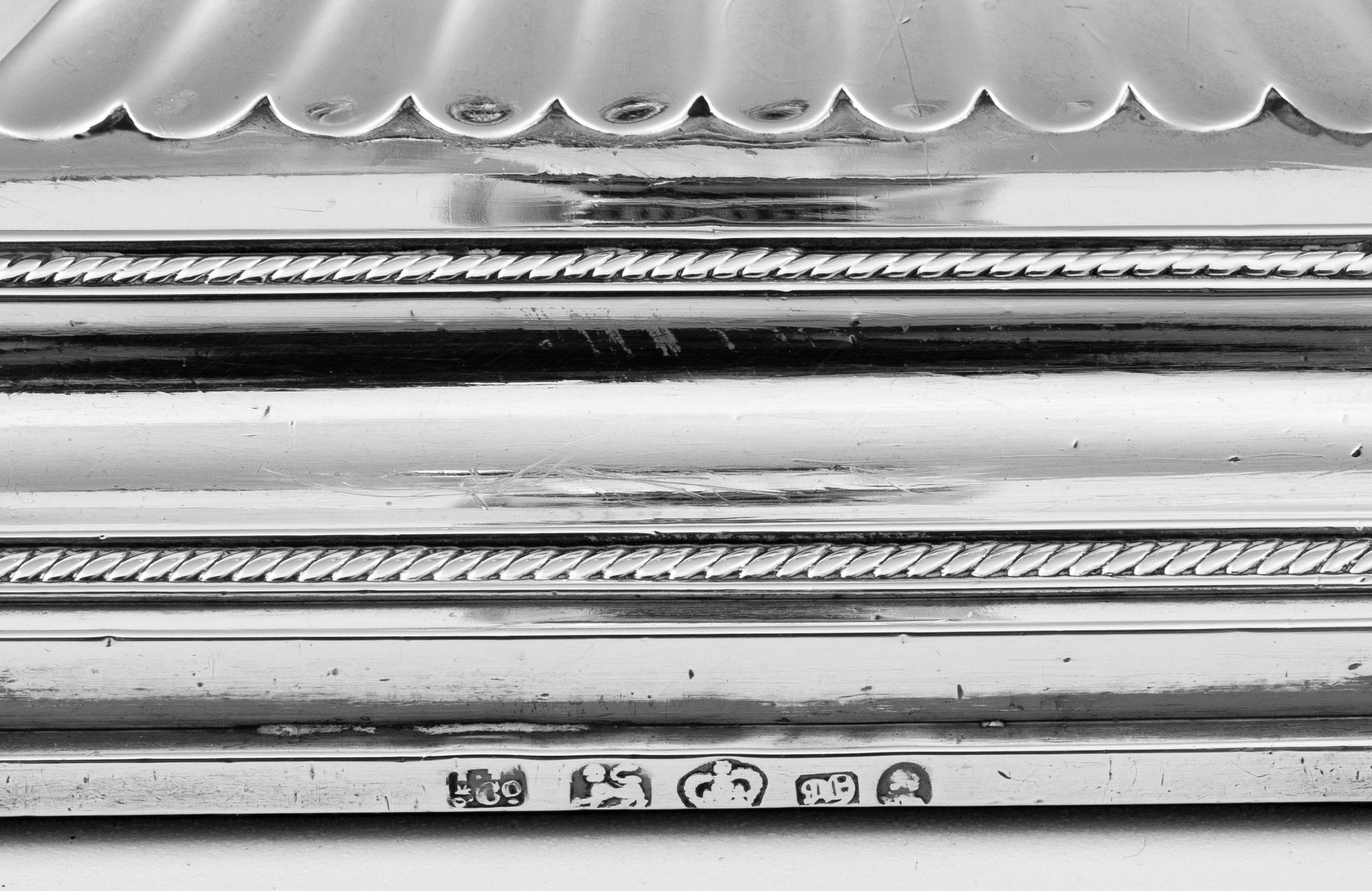 A Pair of English Silver Candlesticks