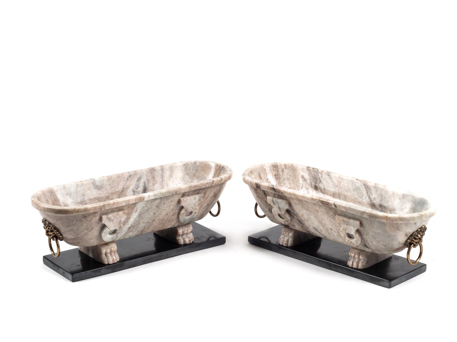 A Pair of Grand Tour Style Marble Sarcophogi