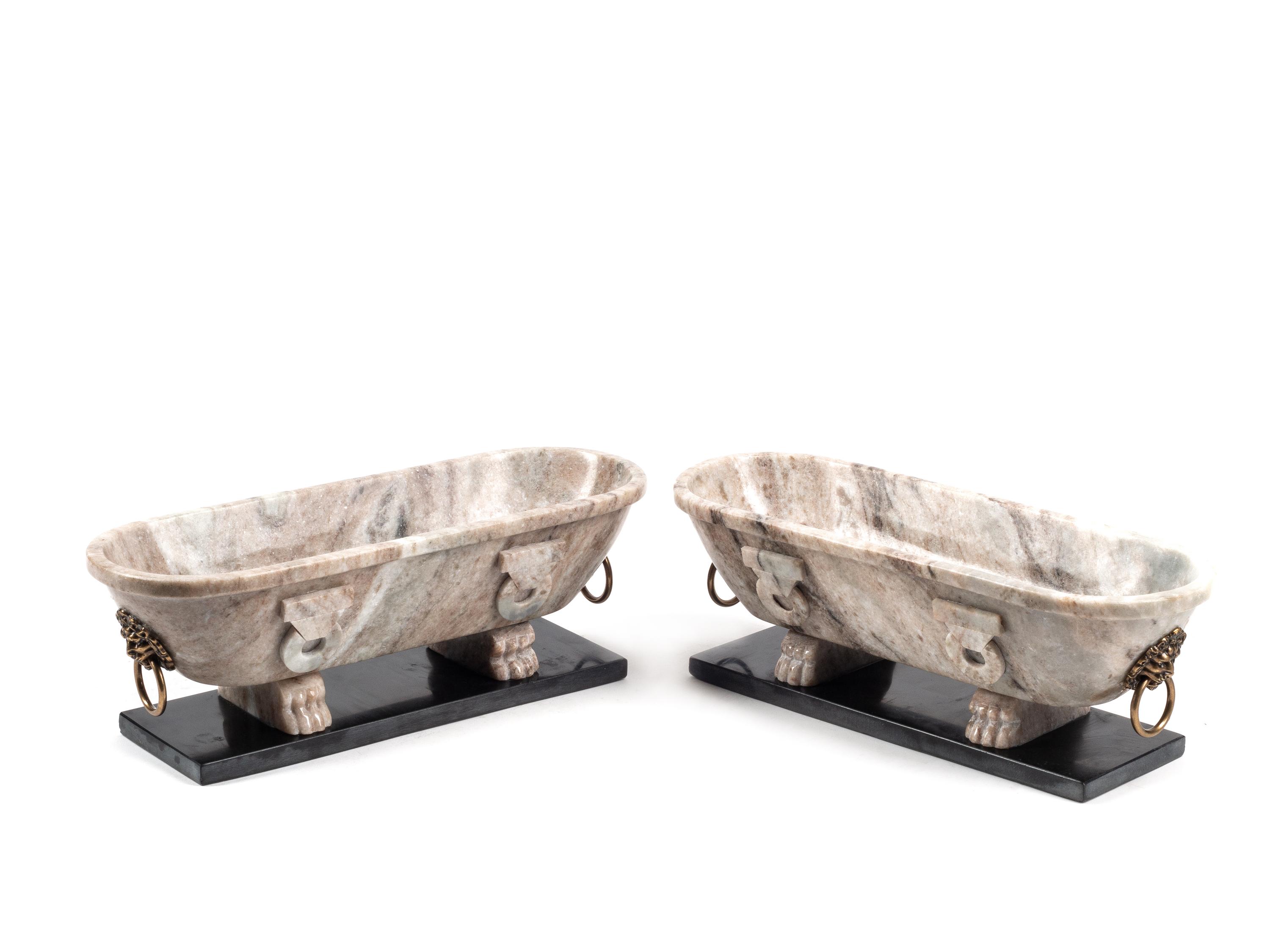 A Pair of Grand Tour Style Marble Sarcophogi