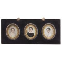 Andrew Robertson (Scottish, 1777-1845) Group of three portrait miniatures of children, probably siblings, dated "1810"