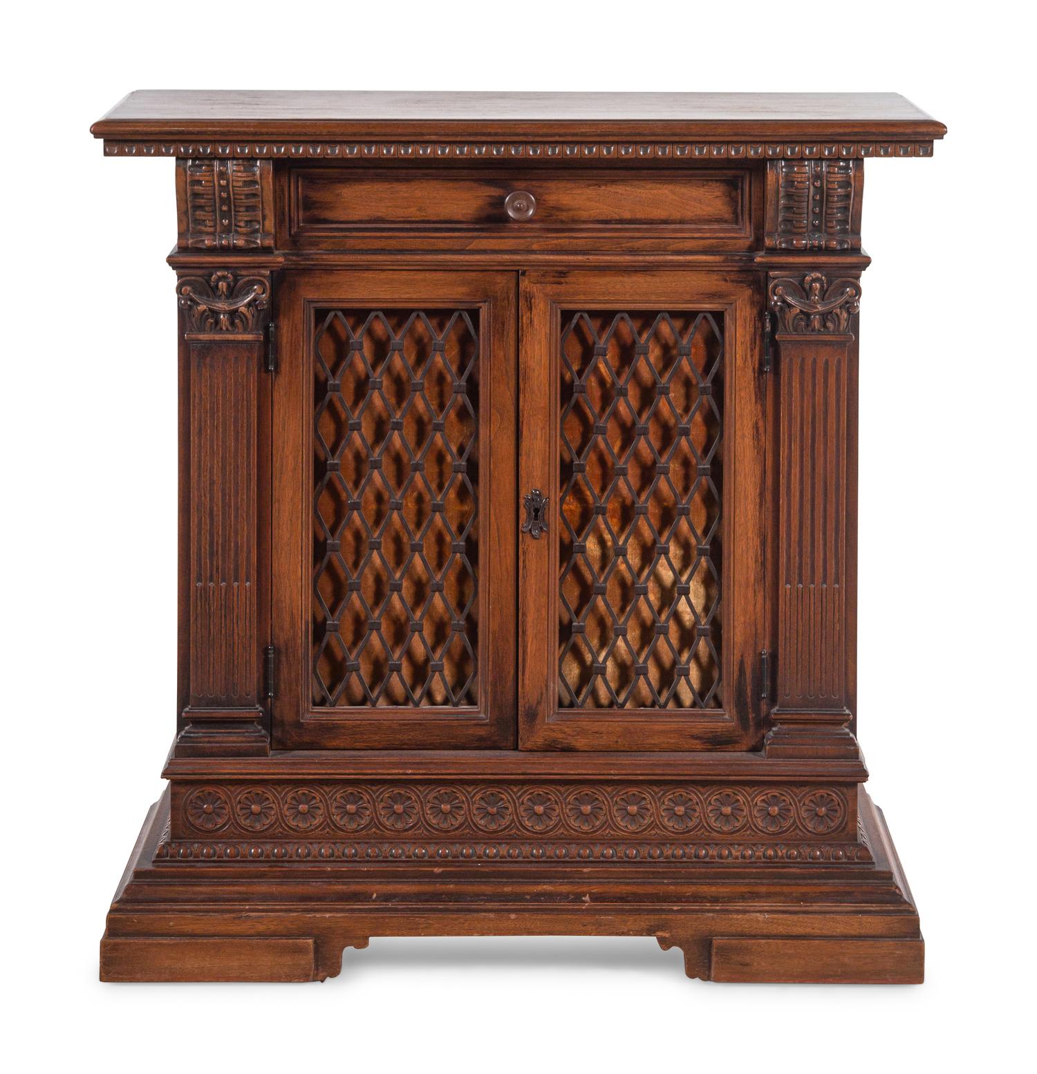 An Italian Baroque Style Walnut Cabinet