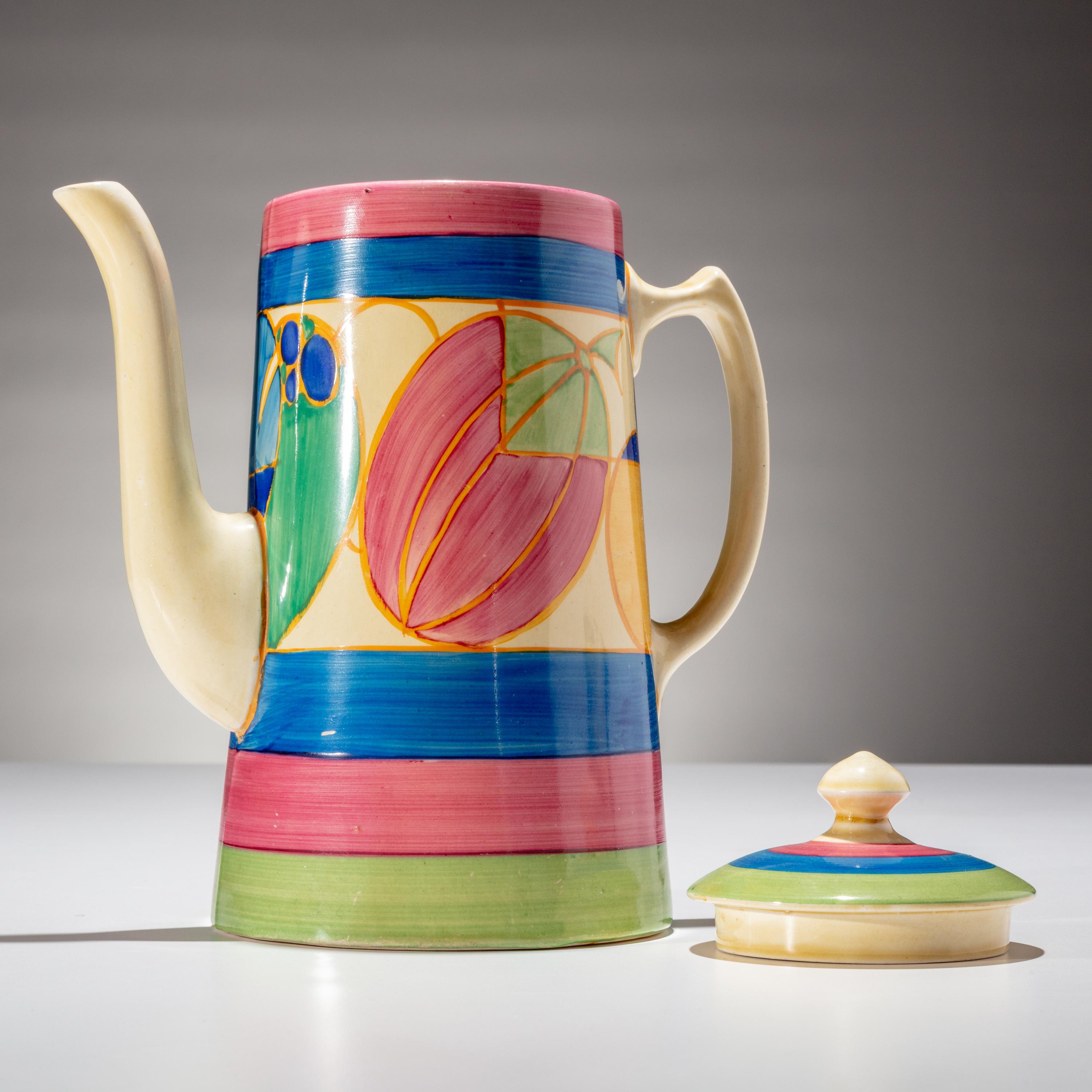 Clarice Cliff (English, 1899–1972) — Gibraltar pattern , 9 pieces and one Melon pattern Coffee Tankard