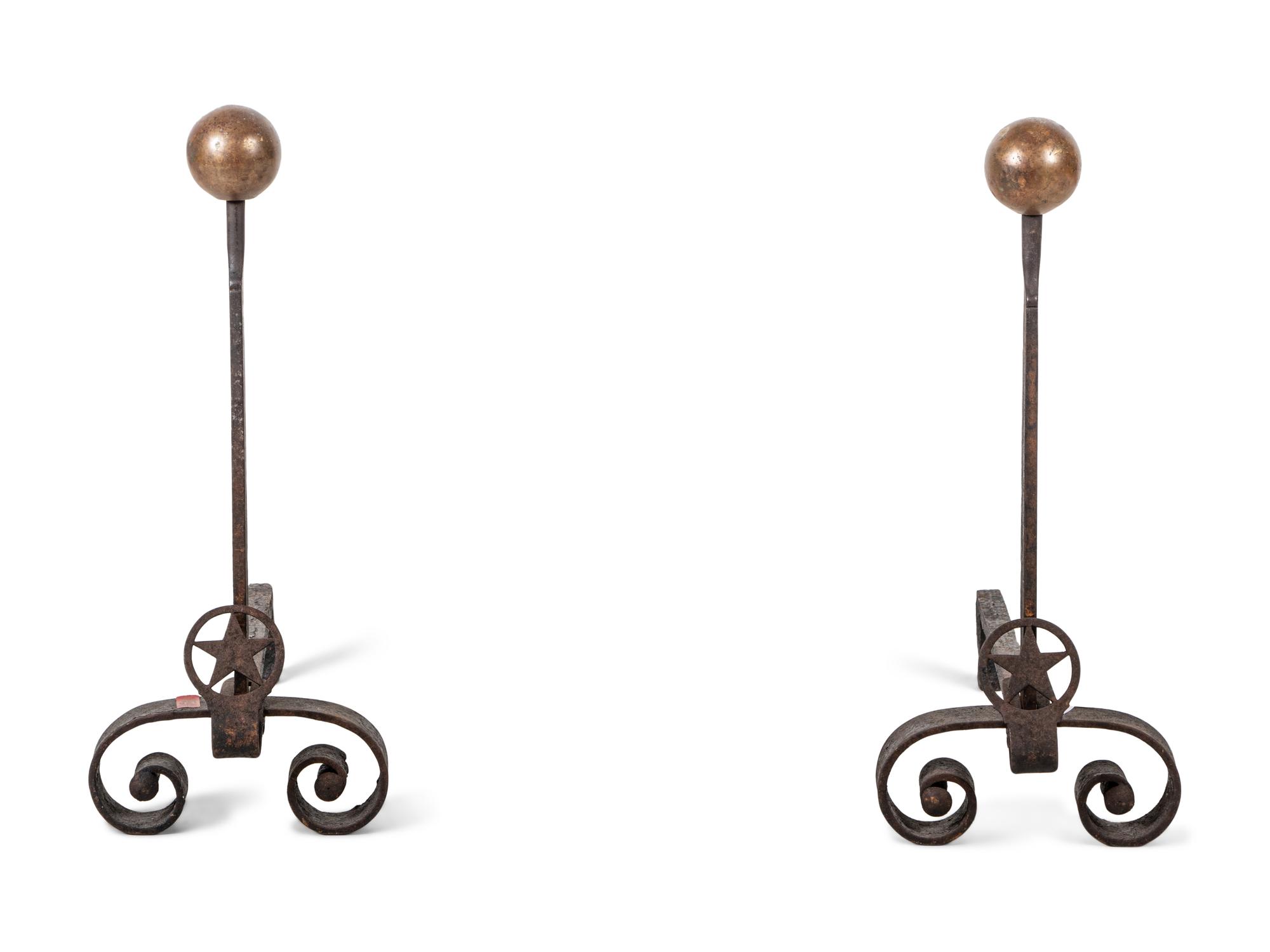 A Pair of Iron Andirons with Star Ornaments