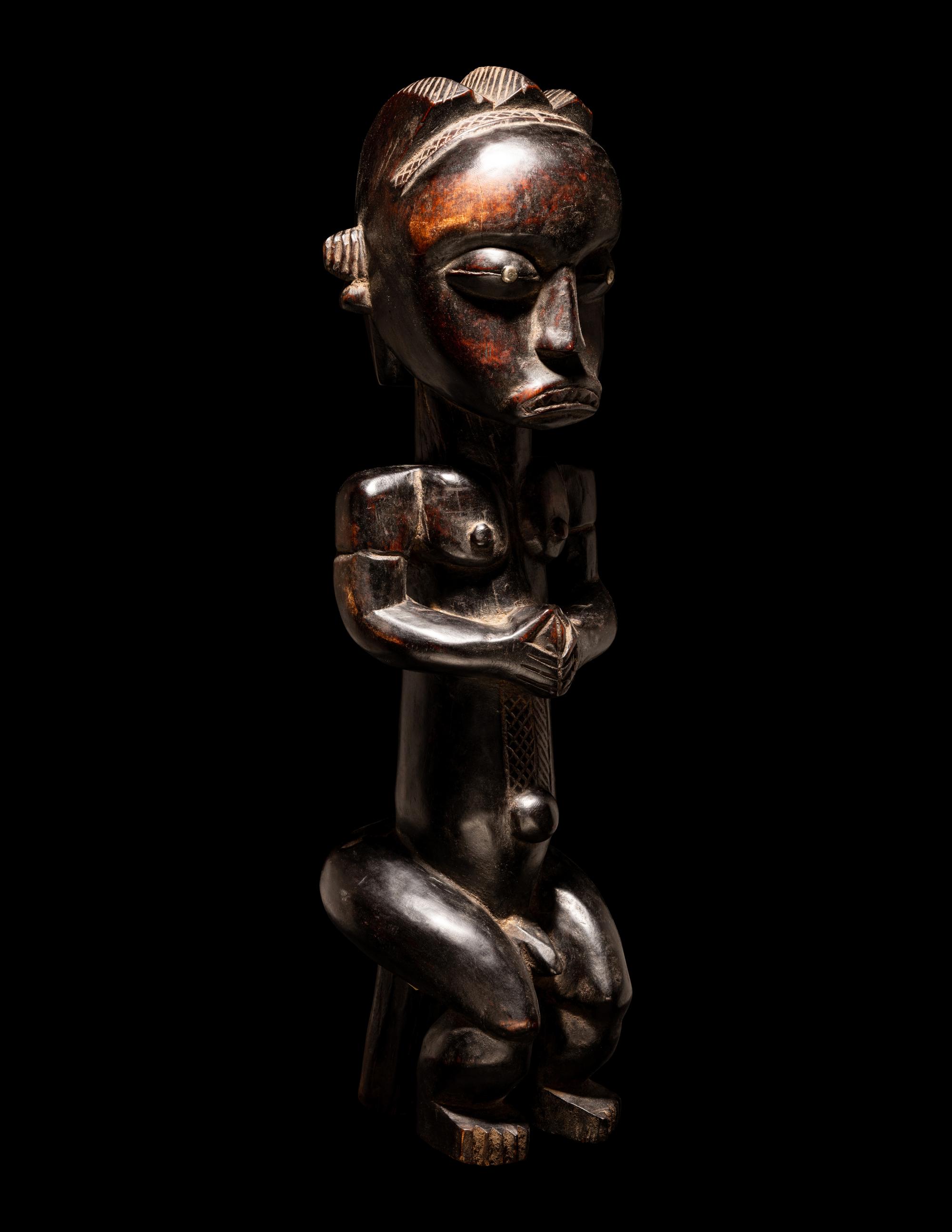 A Fang Wood Standing Figure