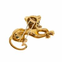 FRED PARIS, YELLOW GOLD, ENAMEL, DIAMOND, AND EMERALD LEOPARD BROOCH