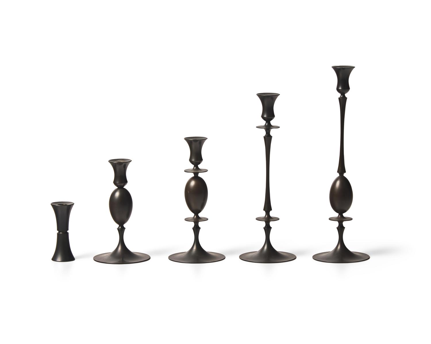 Group of 5 bronze candlesticks