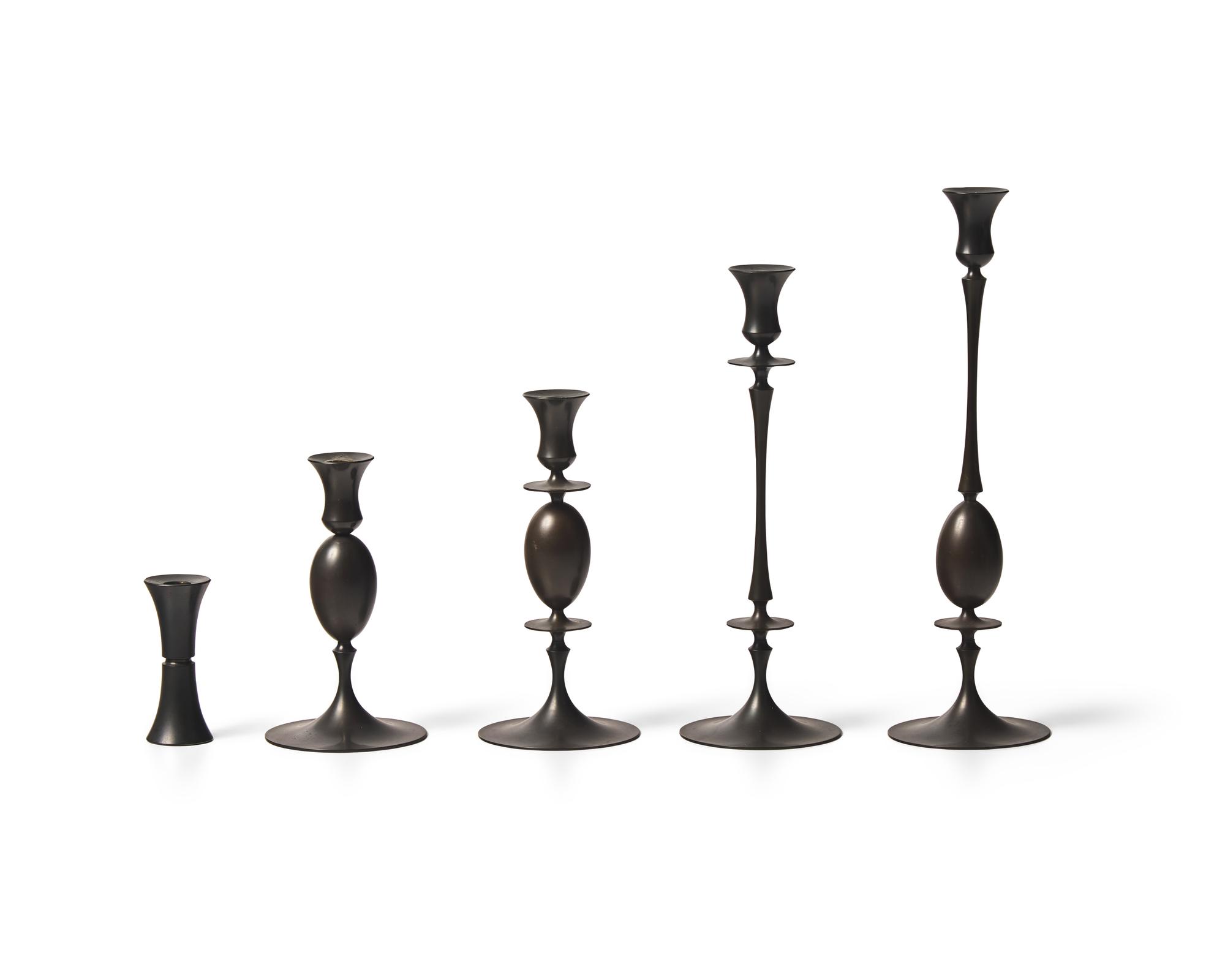 Group of 5 bronze candlesticks