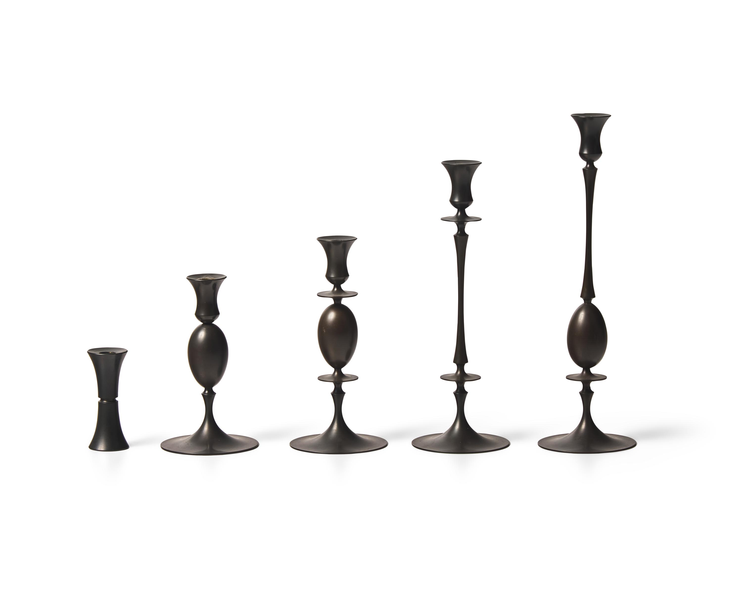 Group of 5 bronze candlesticks