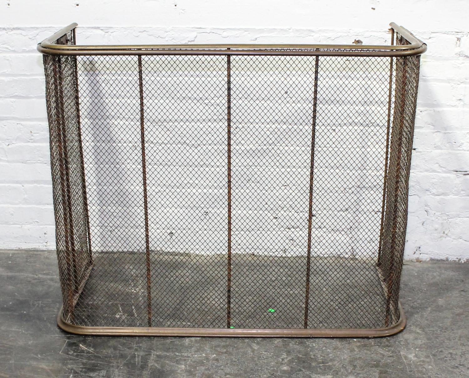 A Continental Brass Fireplace Screen Height 30 inches.