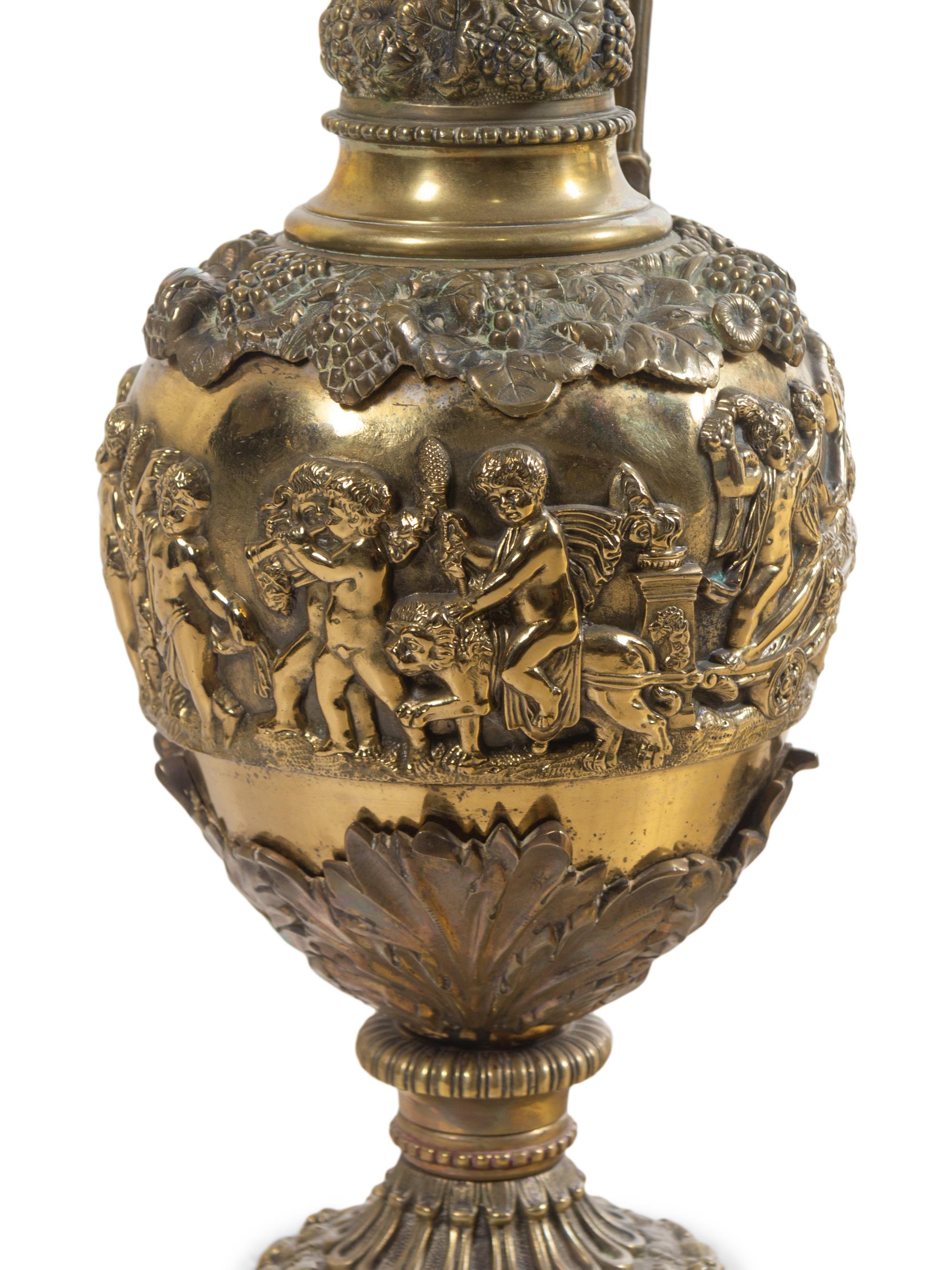 A Pair of Neoclassical Brass Ewers