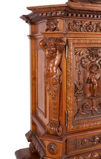 A Renaissance Revival Carved Walnut Cabinet In the Manner of Alexander Roux