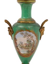 A Pair of Sèvres Style Gilt Metal Mounted Porcelain Urns