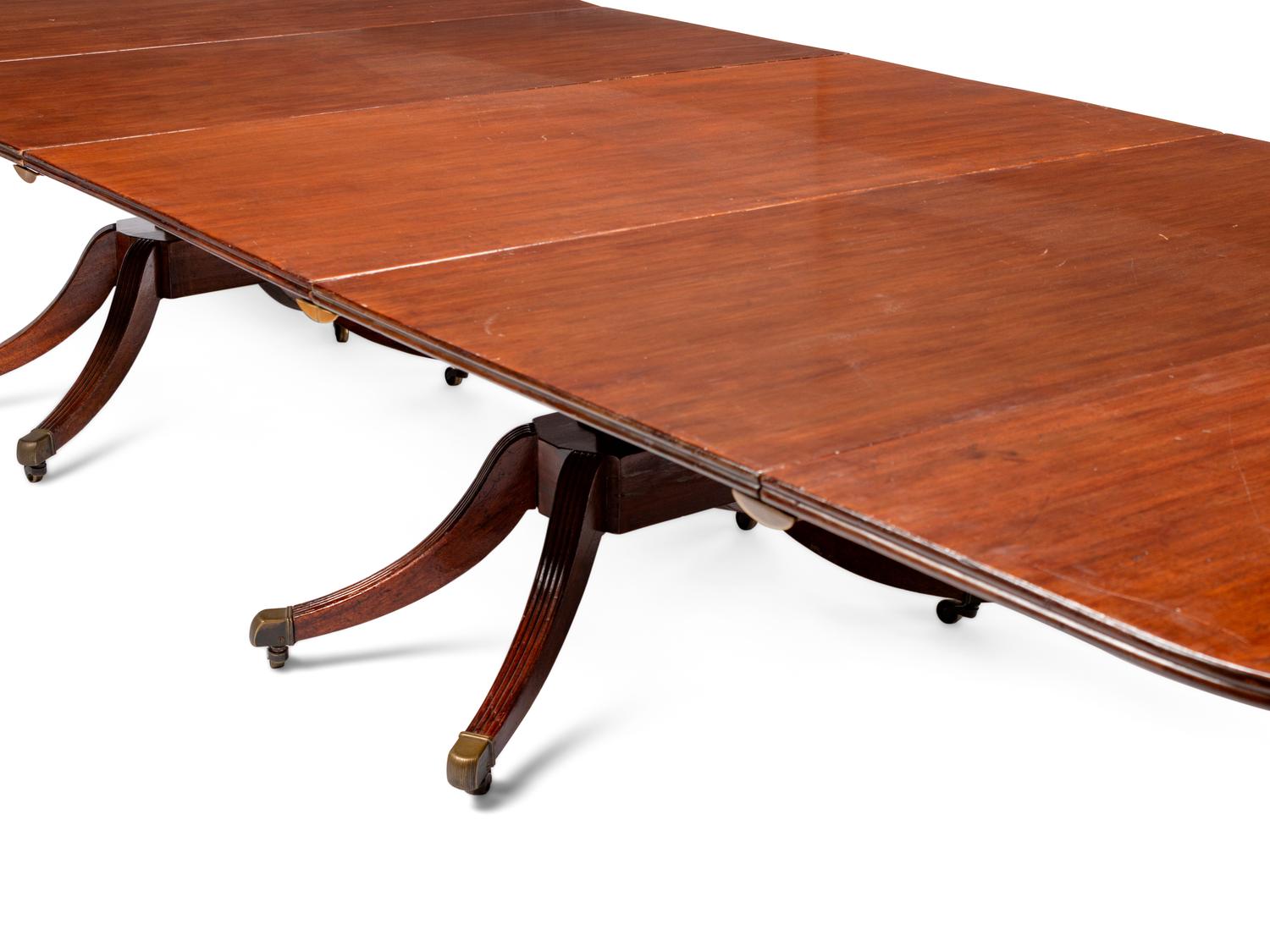 A Regency Mahogany Three-Pedestal Dining Table