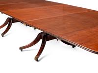 A Regency Mahogany Three-Pedestal Dining Table
