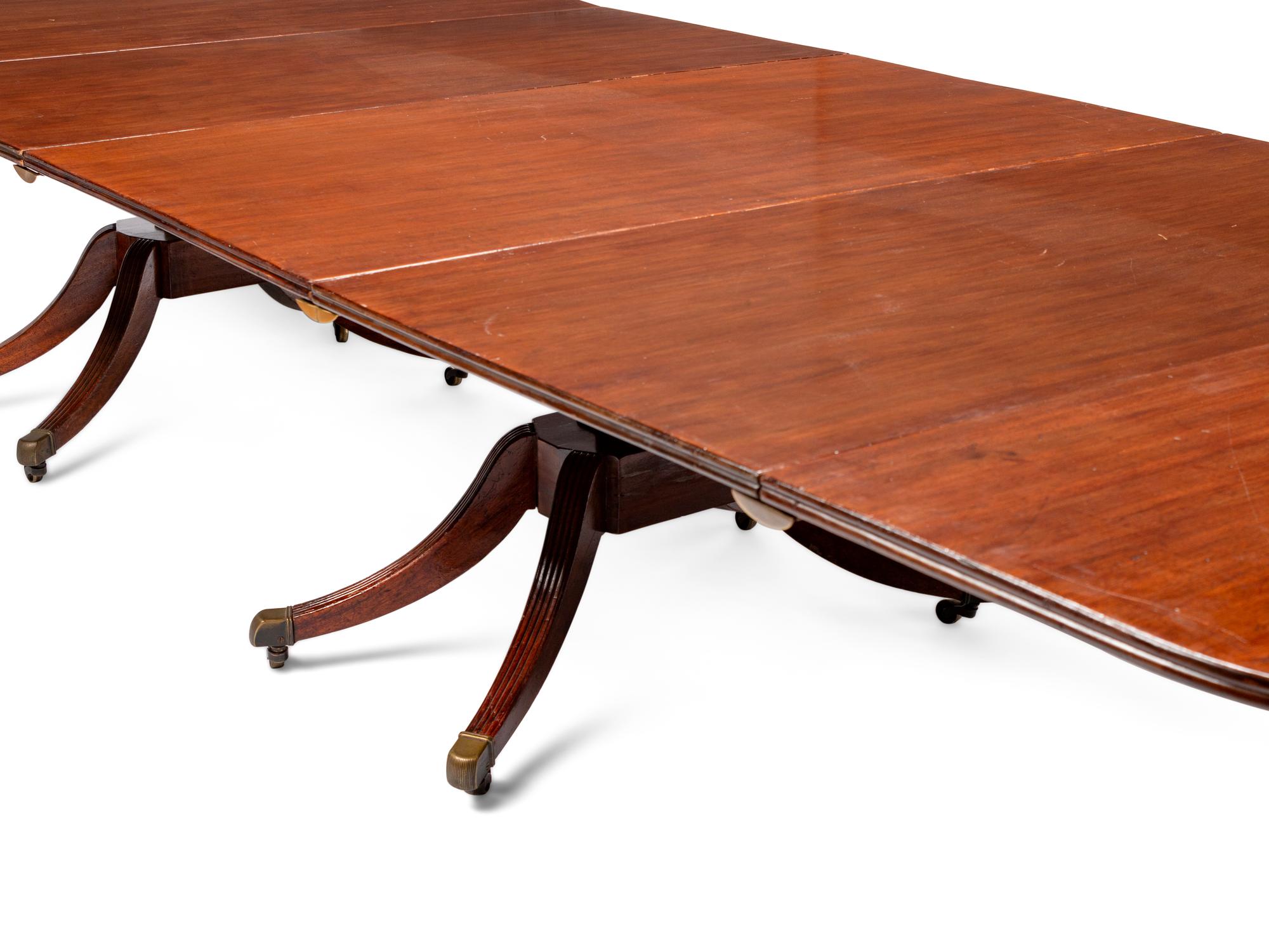 A Regency Mahogany Three-Pedestal Dining Table