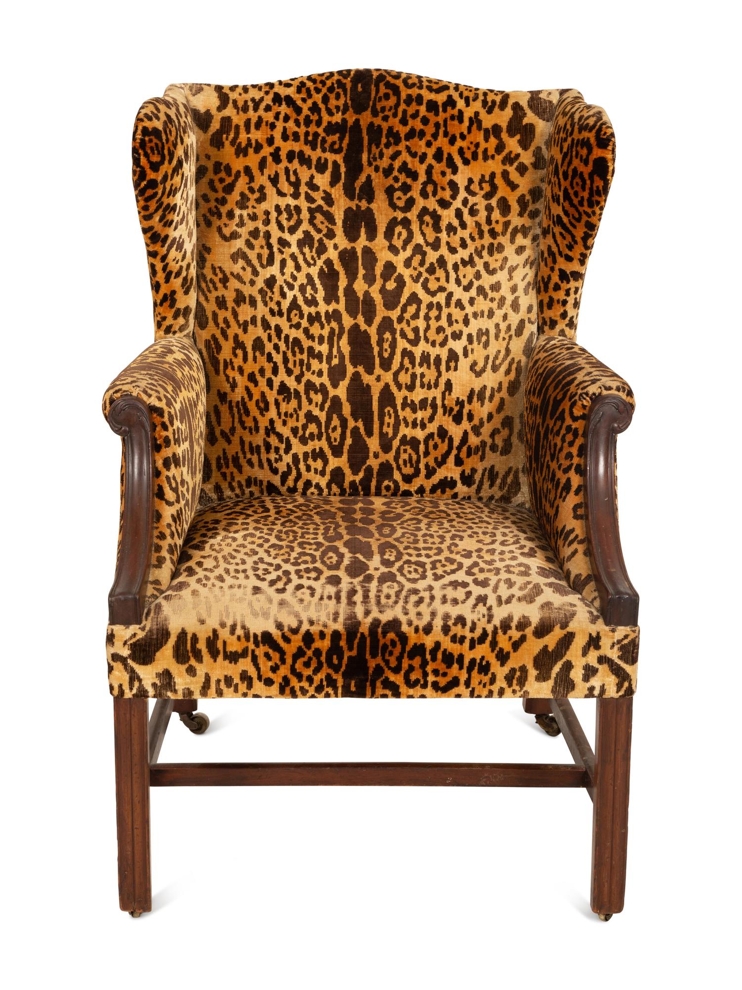 A George III Style Mahogany Wing Chair with Leopard Print Upholstery