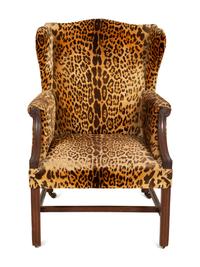 A George III Style Mahogany Wing Chair with Leopard Print Upholstery
