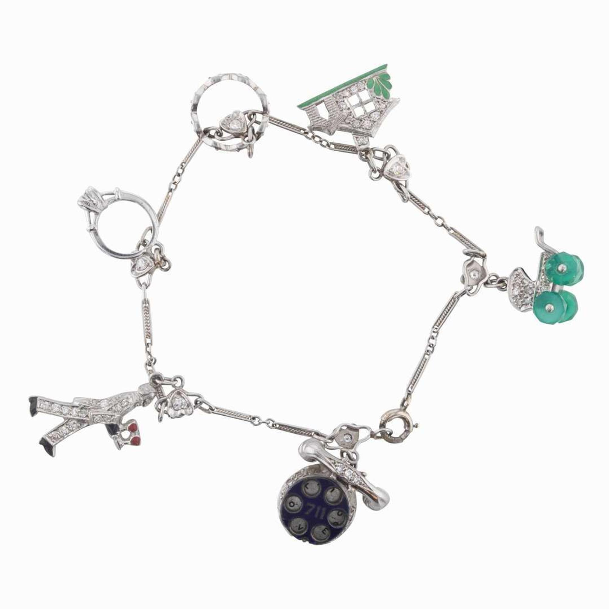 An Art Deco Platinum and Diamond Charm Bracelet