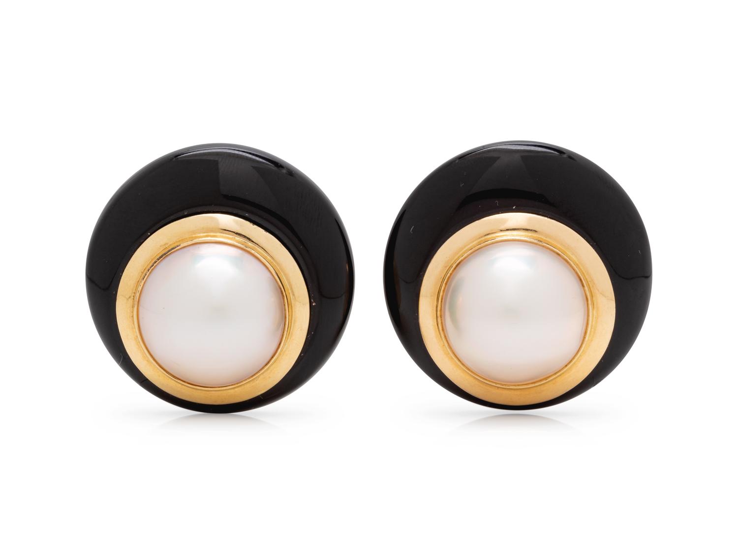 A Pair of 14 Karat Yellow Gold, Cultured Mabe Pearl and Onyx Earclips,