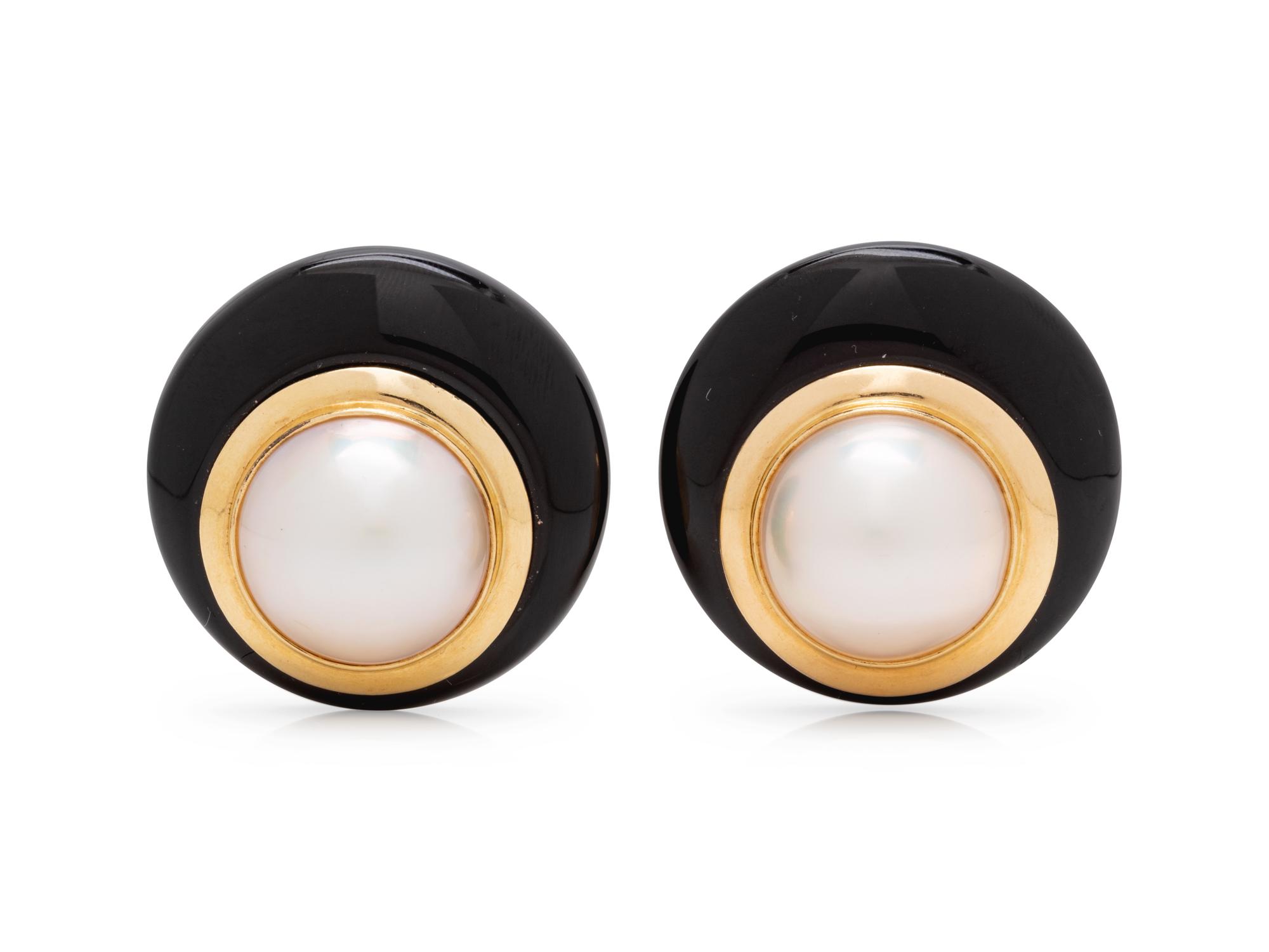 A Pair of 14 Karat Yellow Gold, Cultured Mabe Pearl and Onyx Earclips,