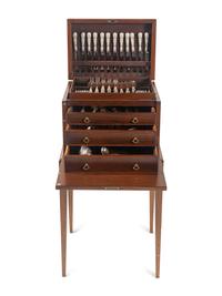 A Tiffany and Co. English King Silver Flatware Service in a Fitted Mahogany Chest