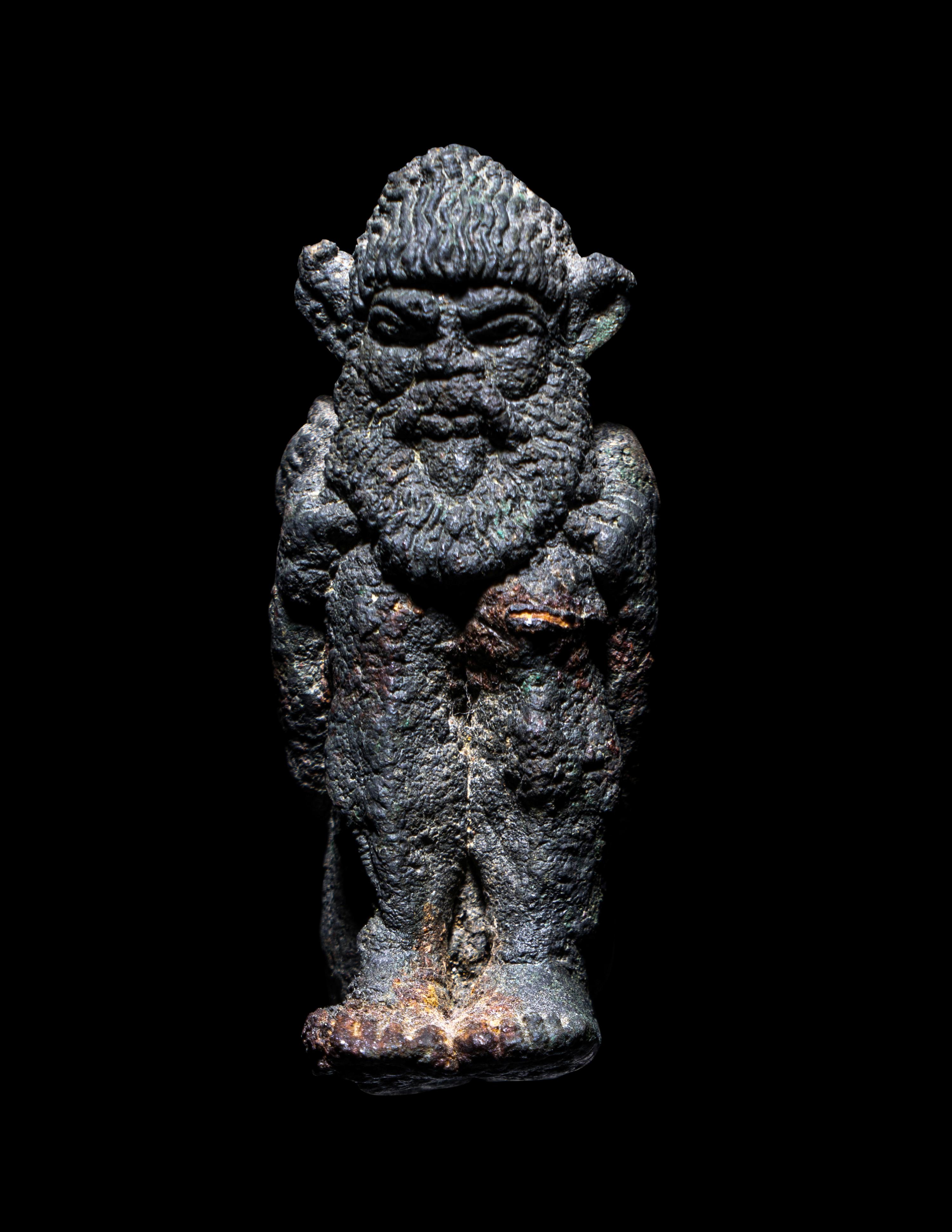 A Greek Bronze Satyr
