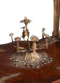 A Pair of Louis XVI Style Gilt Bronze Mounted Tulipwood Side Tables