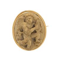 LAVA CAMEO AND YELLOW GOLD BROOCH