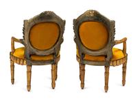 A Pair of Italian Grotto Style Painted and Parcel Gilt Armchairs