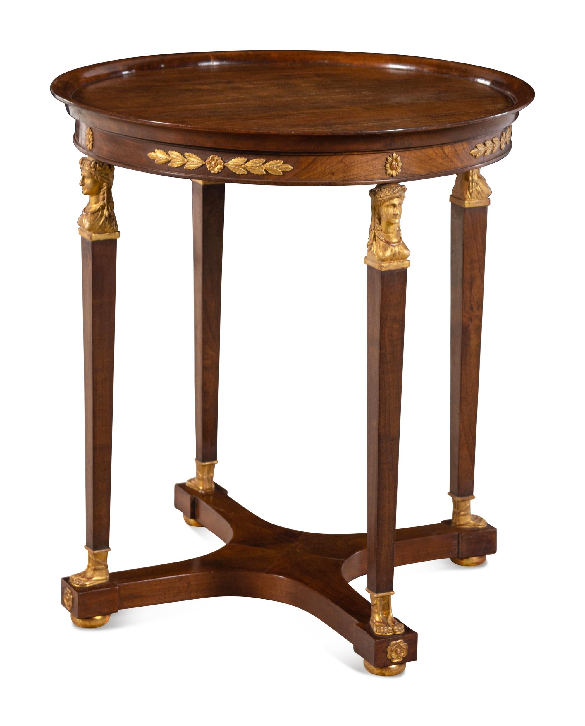 An Empire Style Parcel Gilt Mahogany Side Table