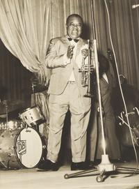 [African Americana] Armstrong, Louis. Inscribed Photograph