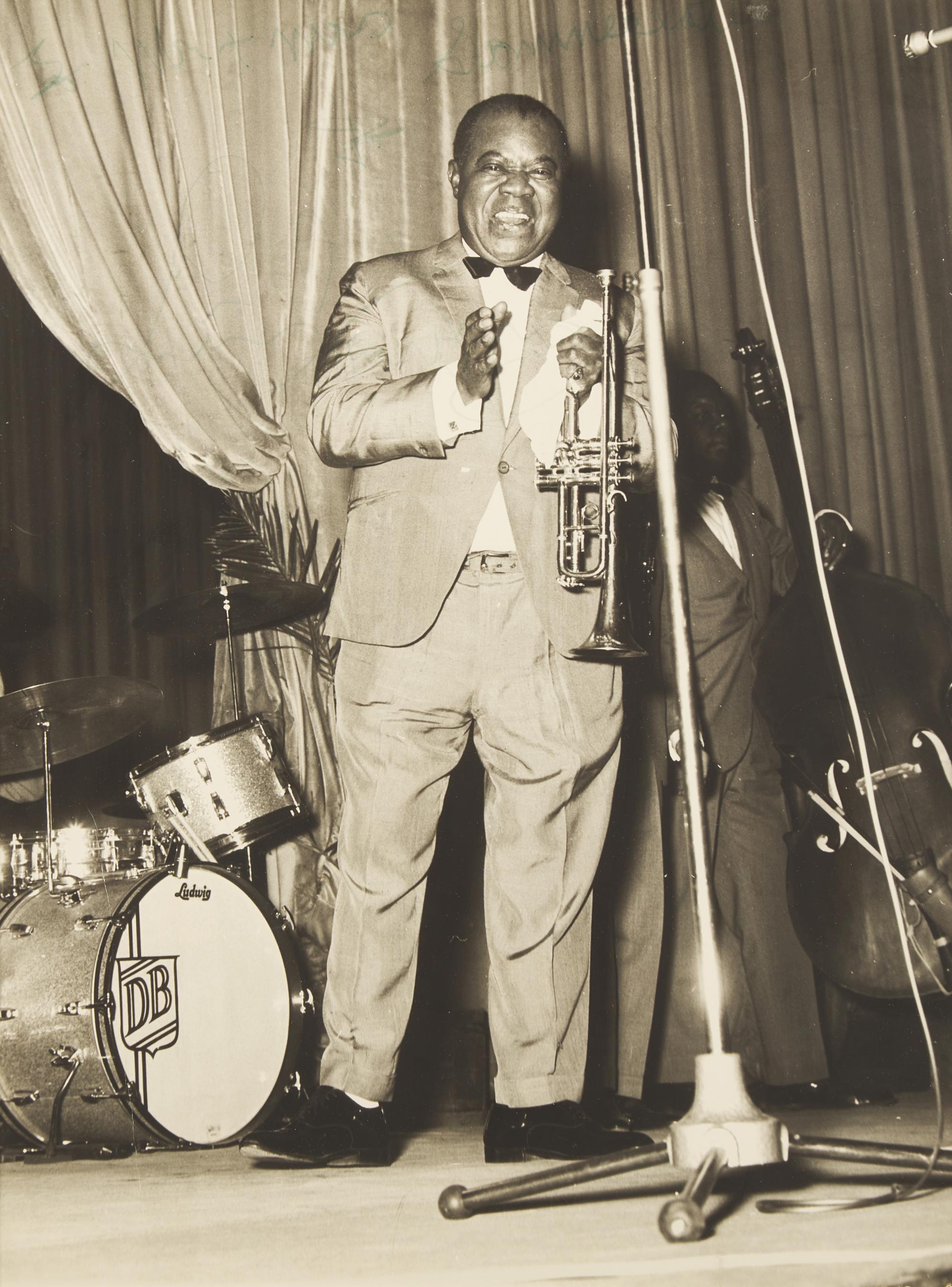 [African Americana] Armstrong, Louis. Inscribed Photograph