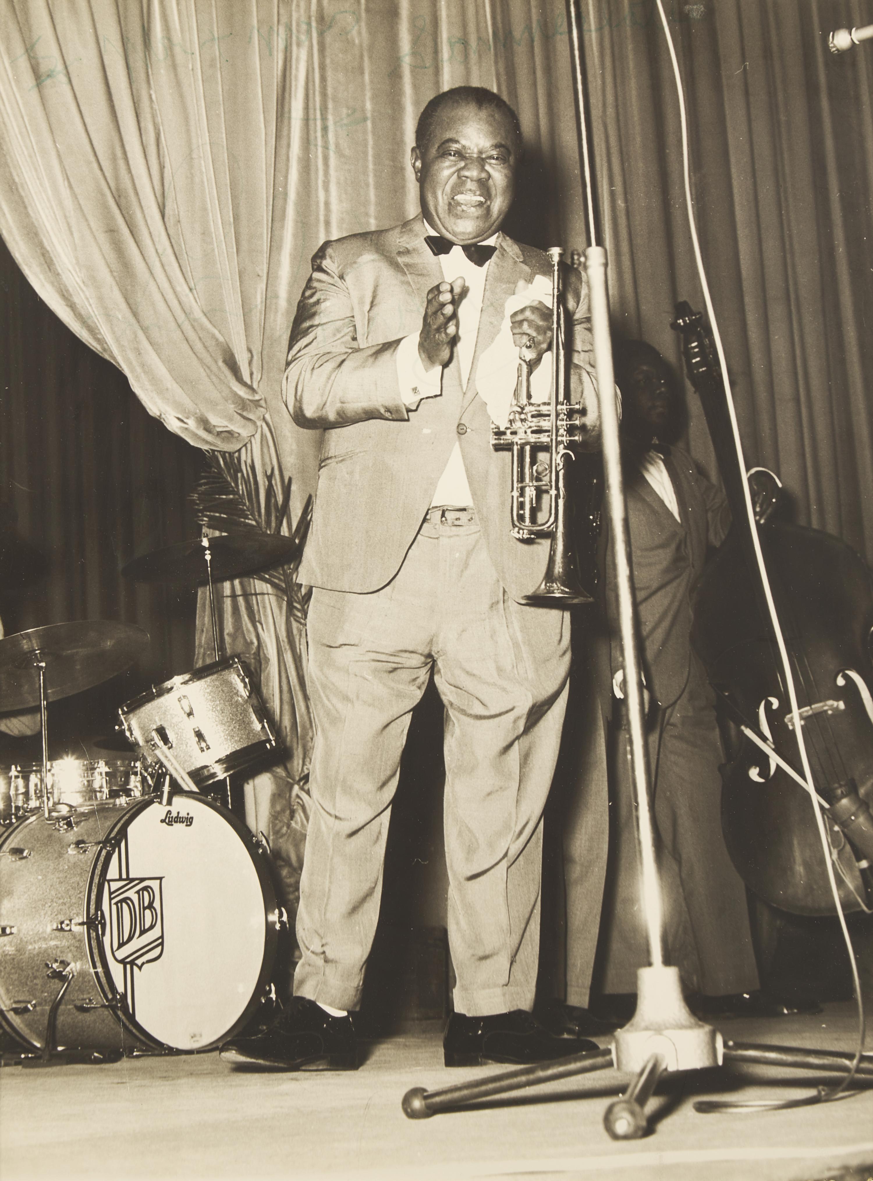 [African Americana] Armstrong, Louis. Inscribed Photograph